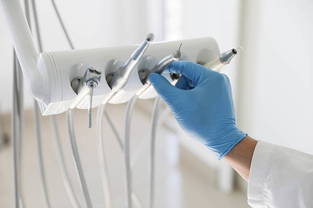Professional Wisdom Tooth Removal technician working in Henderson County County, NC